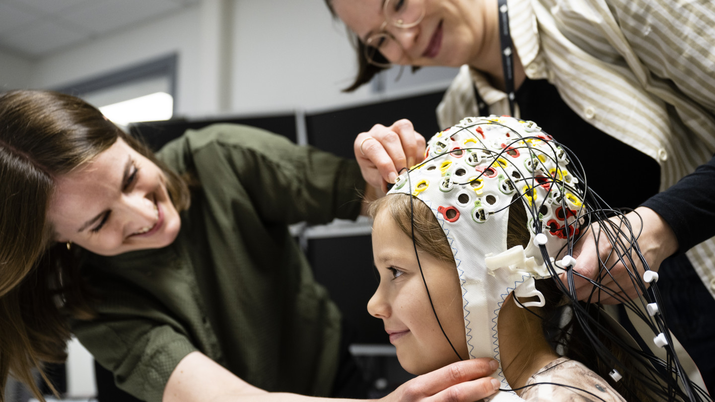 child wearing EEG cap